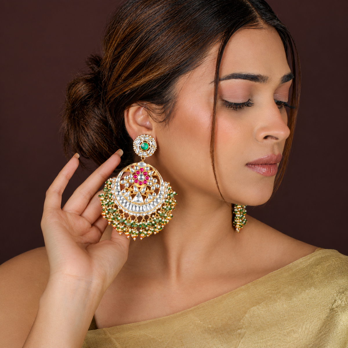 Royal gold-plated kundan chandbali earrings adorned with pearls and beads