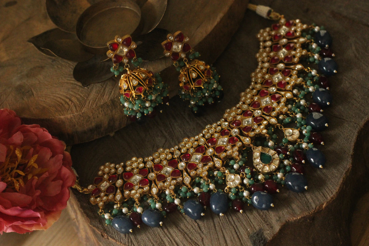 Pink stone necklace set with blue beads and jhumki