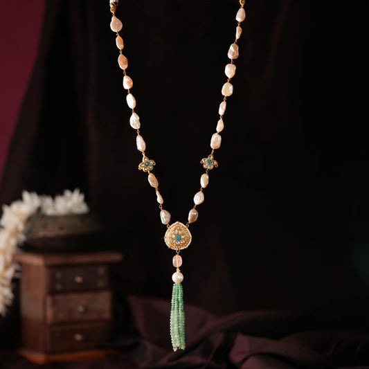 Indo western wedding cum party wear jadau maala with natural baroque pearls and pastel shade kundan design