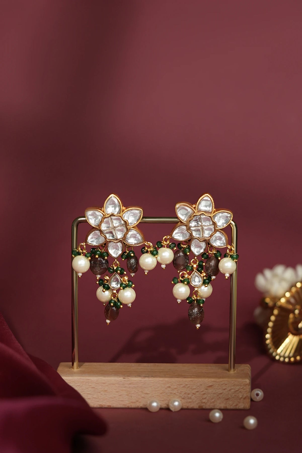 Handcrafted earrings with shell pearls and green beads