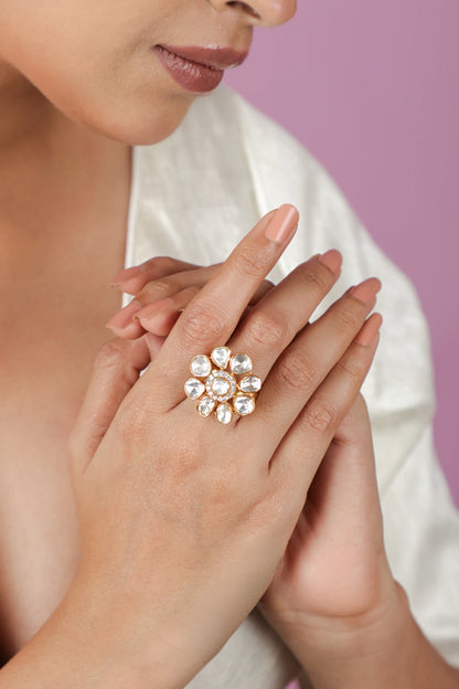 gold plated ring  featuring a floral design with uncut moissanite stones