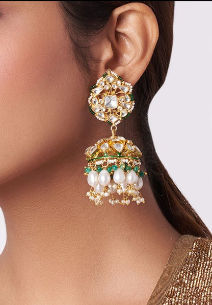 Jhumki earrings with white jadtar stones , beaded with pearls and emerald beads