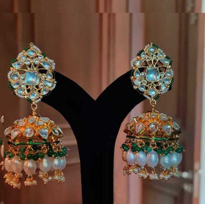 Jhumki earrings with white jadtar stones , beaded with pearls and emerald beads