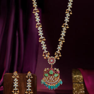 Jadau long pendant necklace with ruby stones and sea green pastel beads