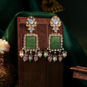 Handcrafted earings with carved stone and pastel pink drops