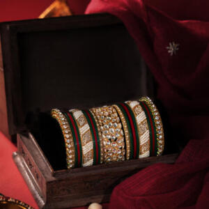 Punjabi chuda cum bridal bangles set in emerald green and red bangles