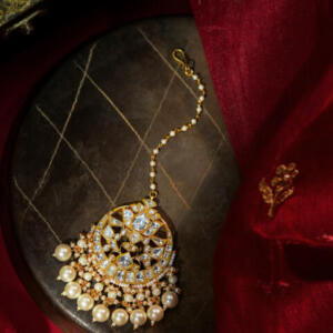 Statement tikka with pearls in traditional design