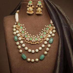 Traditional indian jewellery set with pearl and green beads