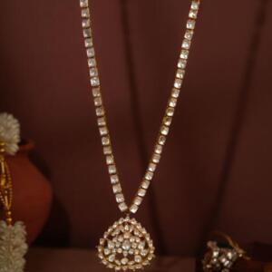 Gold finish long necklace with pearl
