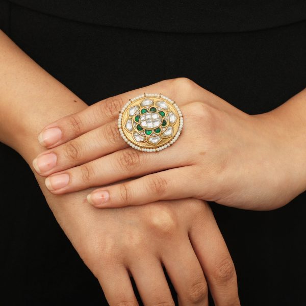 OVEL SHAPE RING WITH GREEN AND WHITE STONES