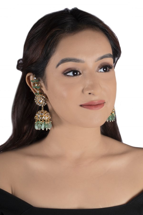 WHITE STONE JHUMKI AND SEA GREEN BEADS WITH WHITE HANGING ATTACHED EAR CHAIN