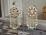 stud earrings in sea green and gold