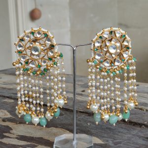 stud earrings in sea green and gold