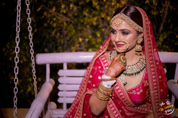 WHITE JADTAR STONE TOPS WITH JHUMKI IN GREEN BEADS